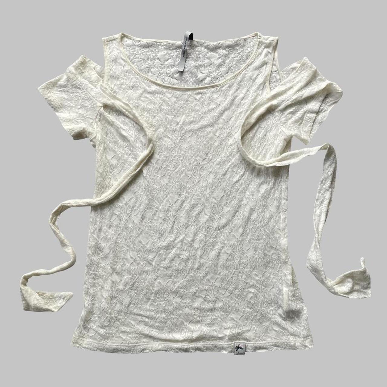 Cop Copine off-white lace cut-out top.