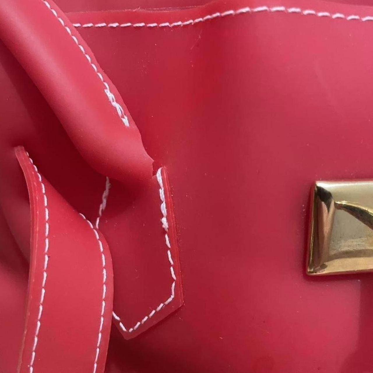 Red jelly pvc firkin bag.