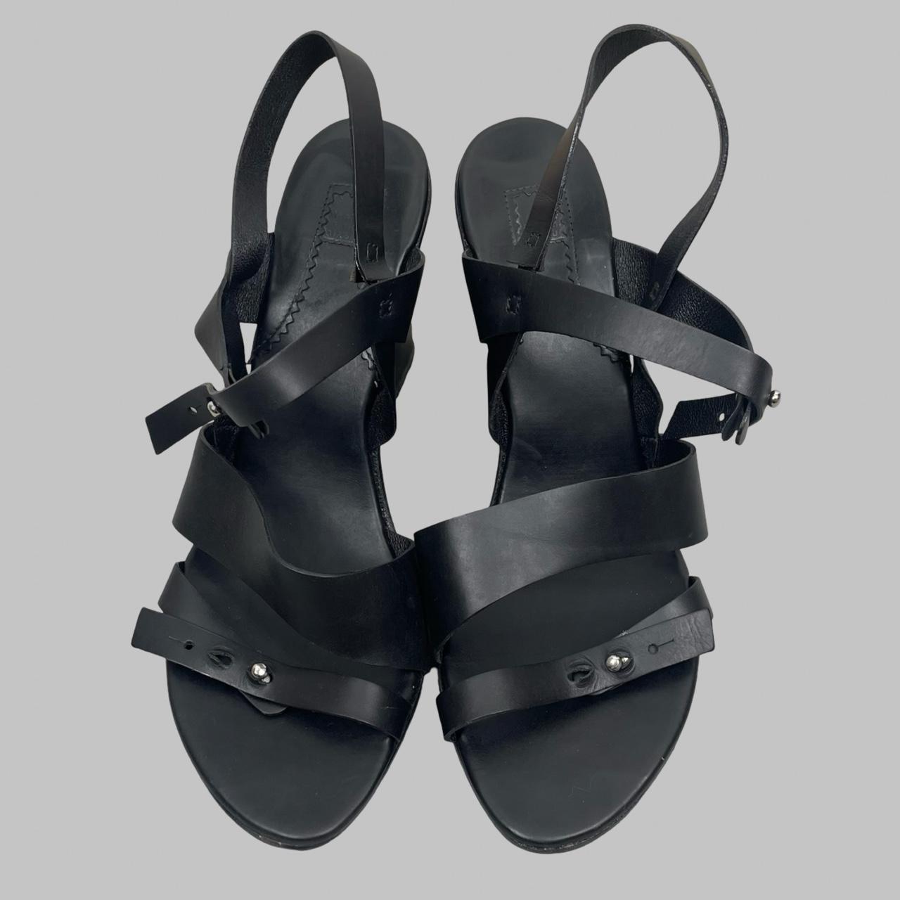 Marithé + François Girbaud black leather wooden wedge sandals.