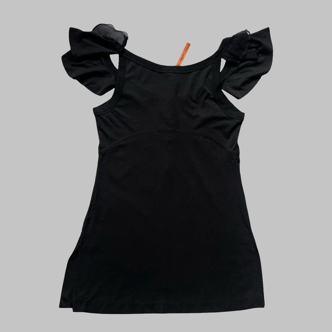 Cop copine sleeveless black top.