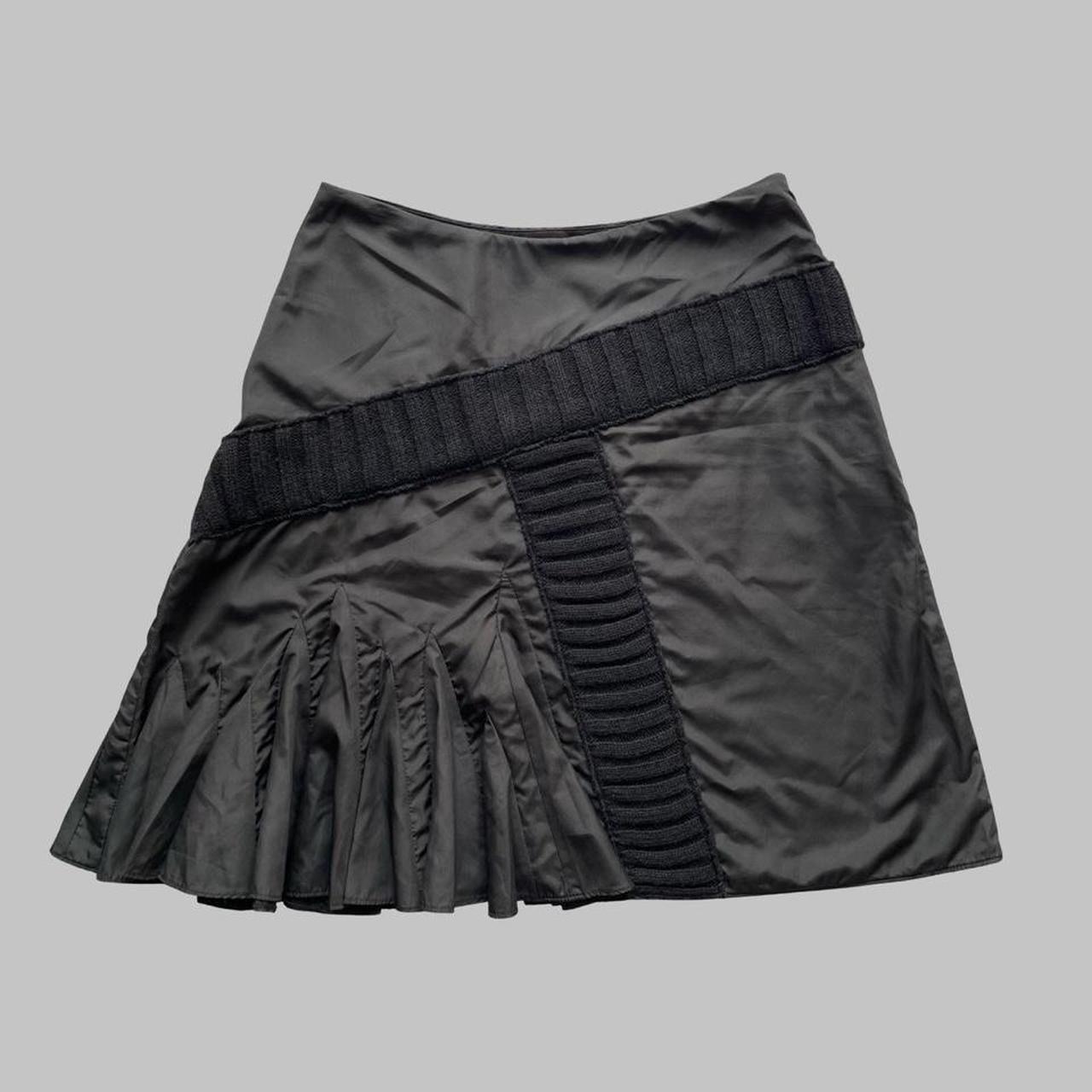 Italian multi-fabric black skirt.