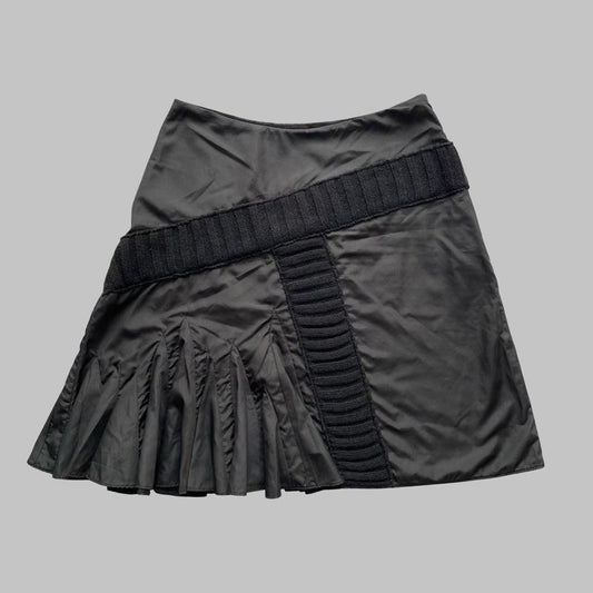 Italian multi-fabric black skirt.