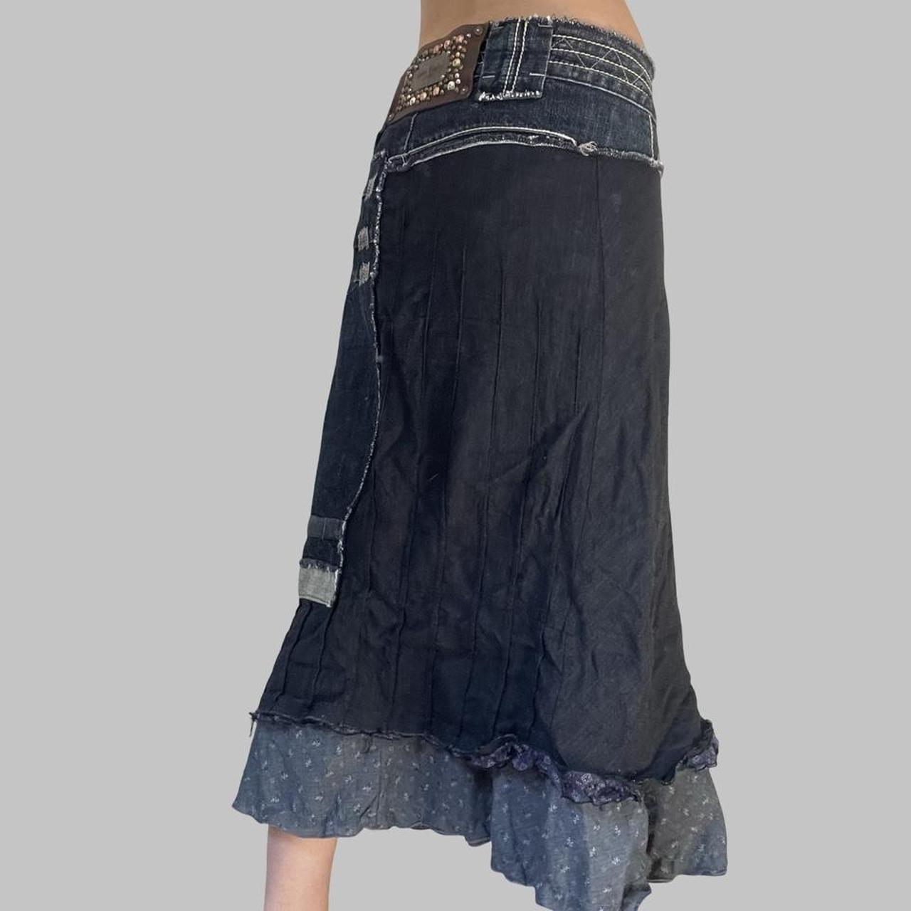 Italian bi-material denim midi skirt.