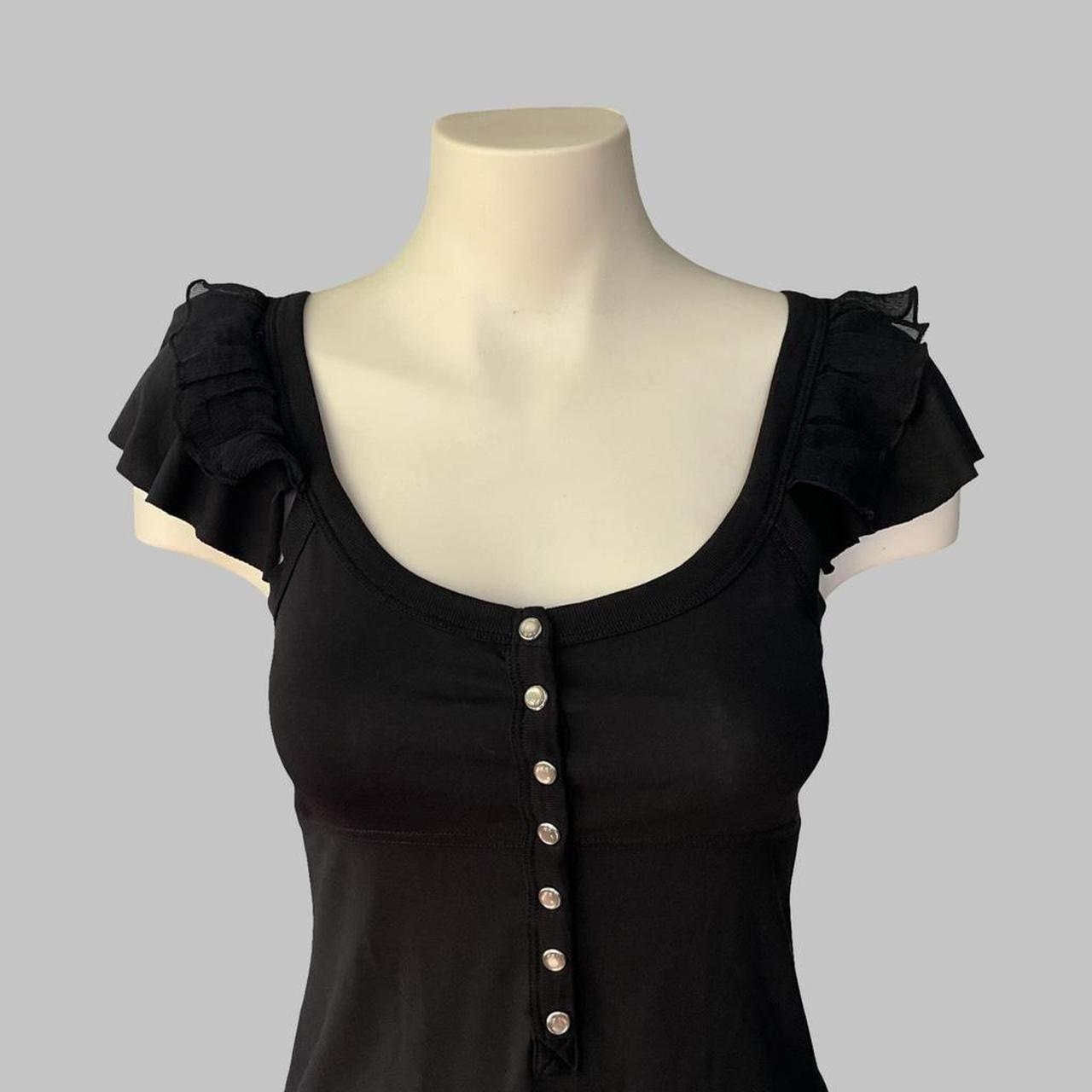 Cop copine sleeveless black top.