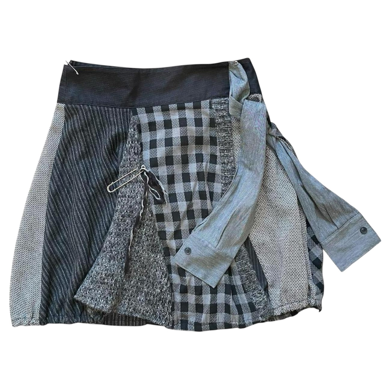 Italian multi-fabric trompe-l’œil wrap skirt.