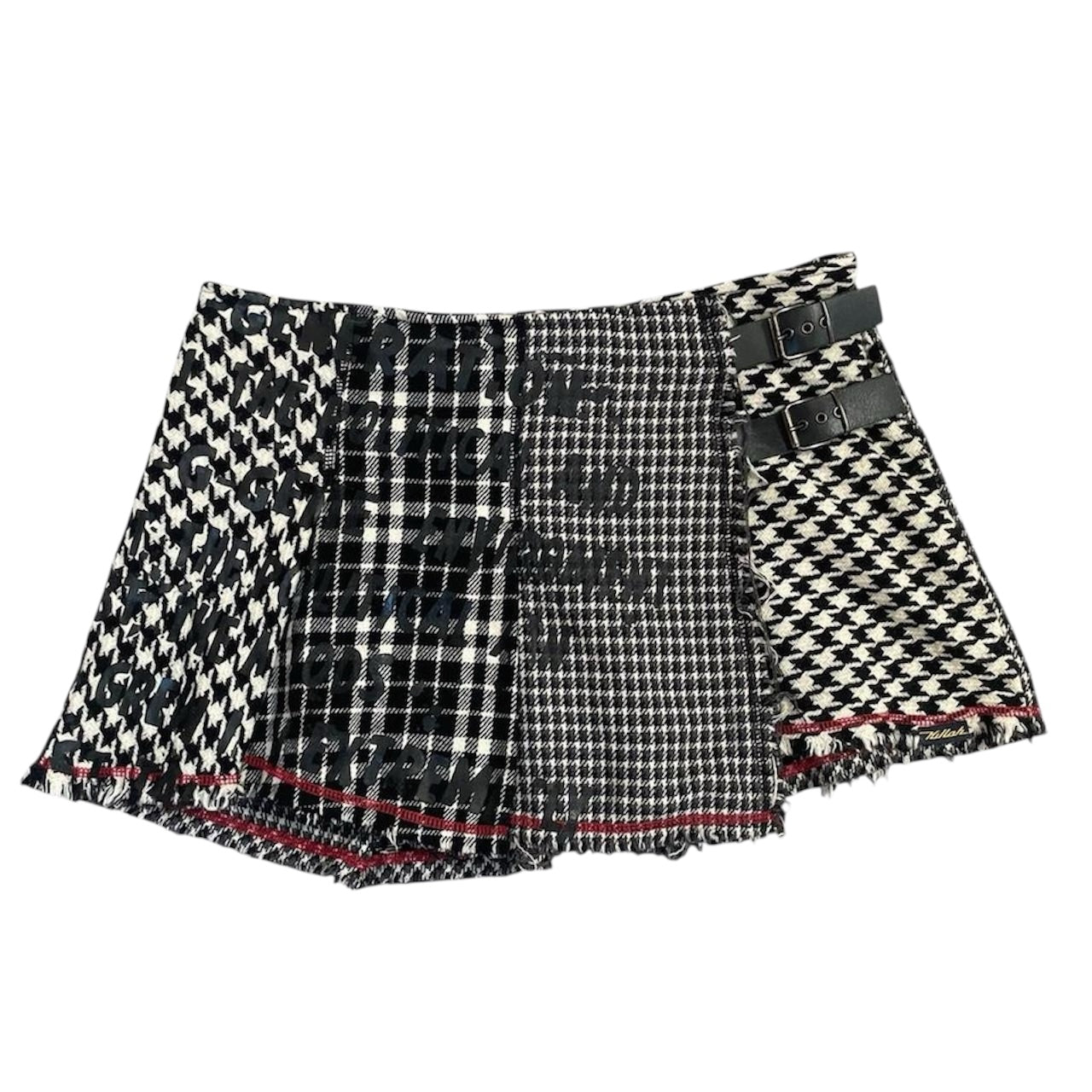 Dogtooth / plaid mini skirt.