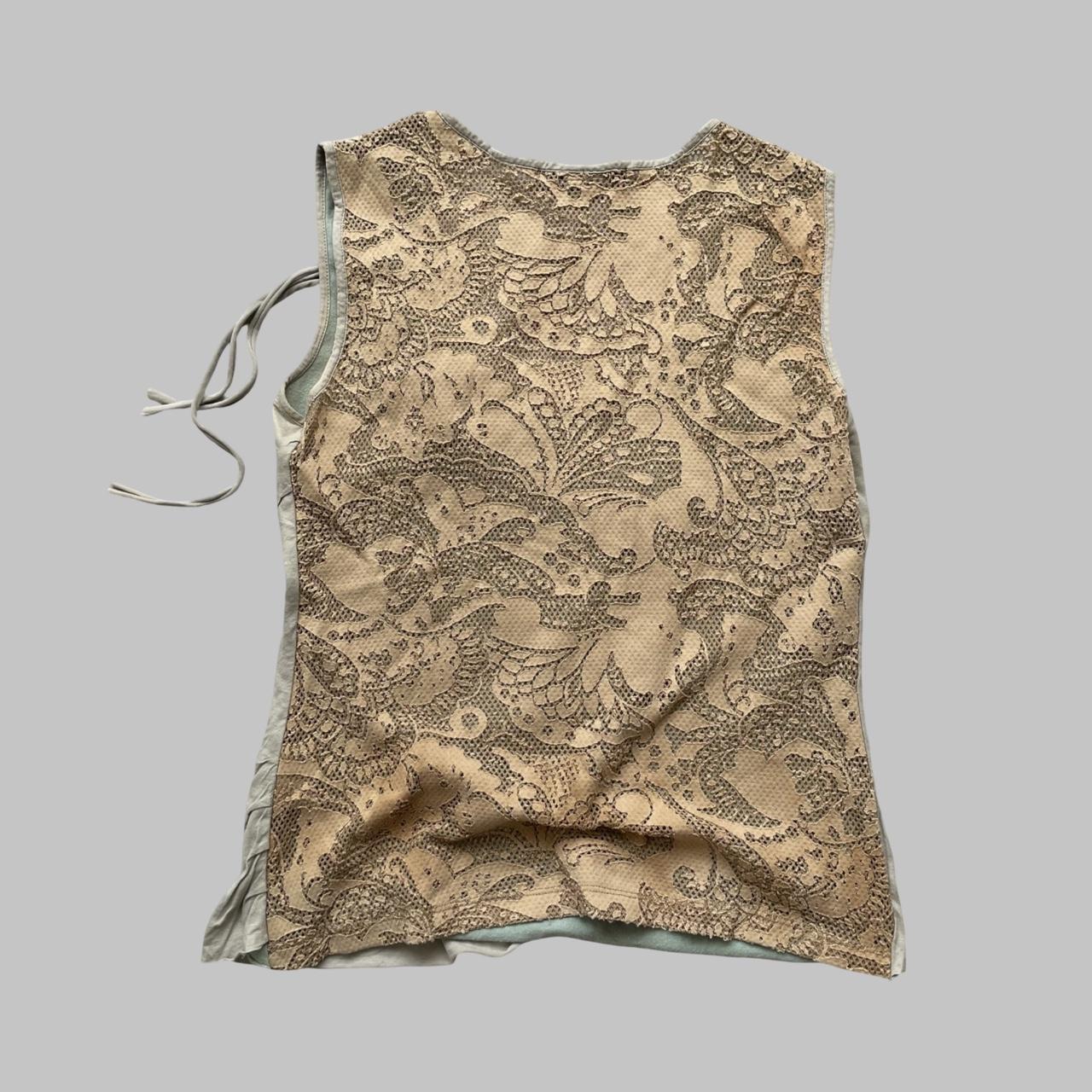 Beige double layered distressed tank top.