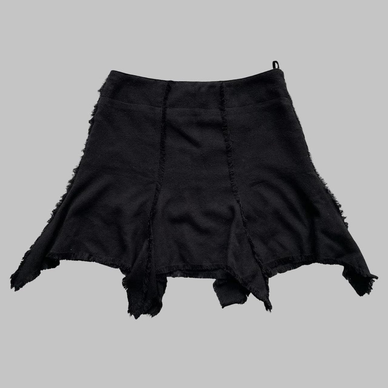 Black Biche de Bère black asymmetrical mini skirt.