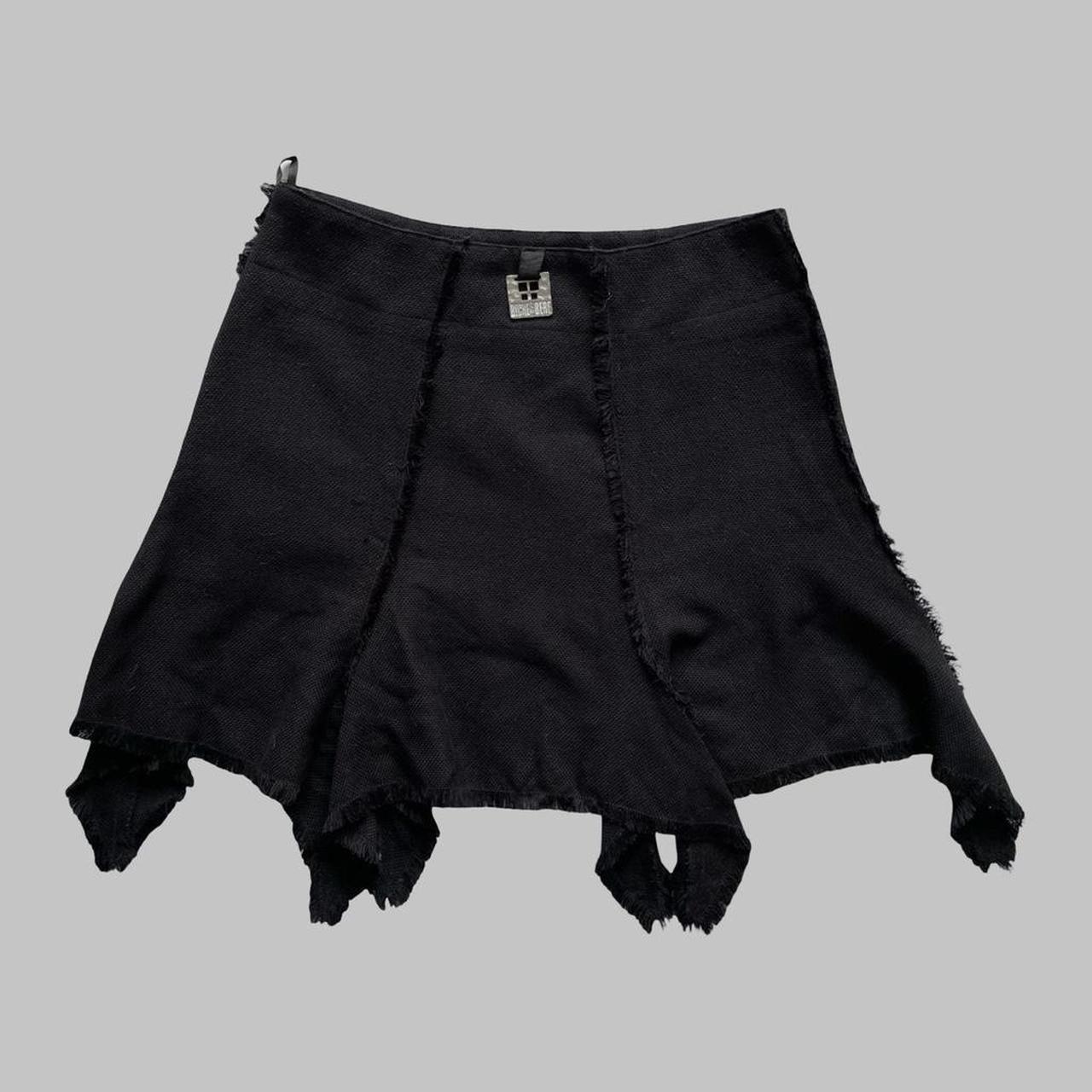 Black Biche de Bère black asymmetrical mini skirt.