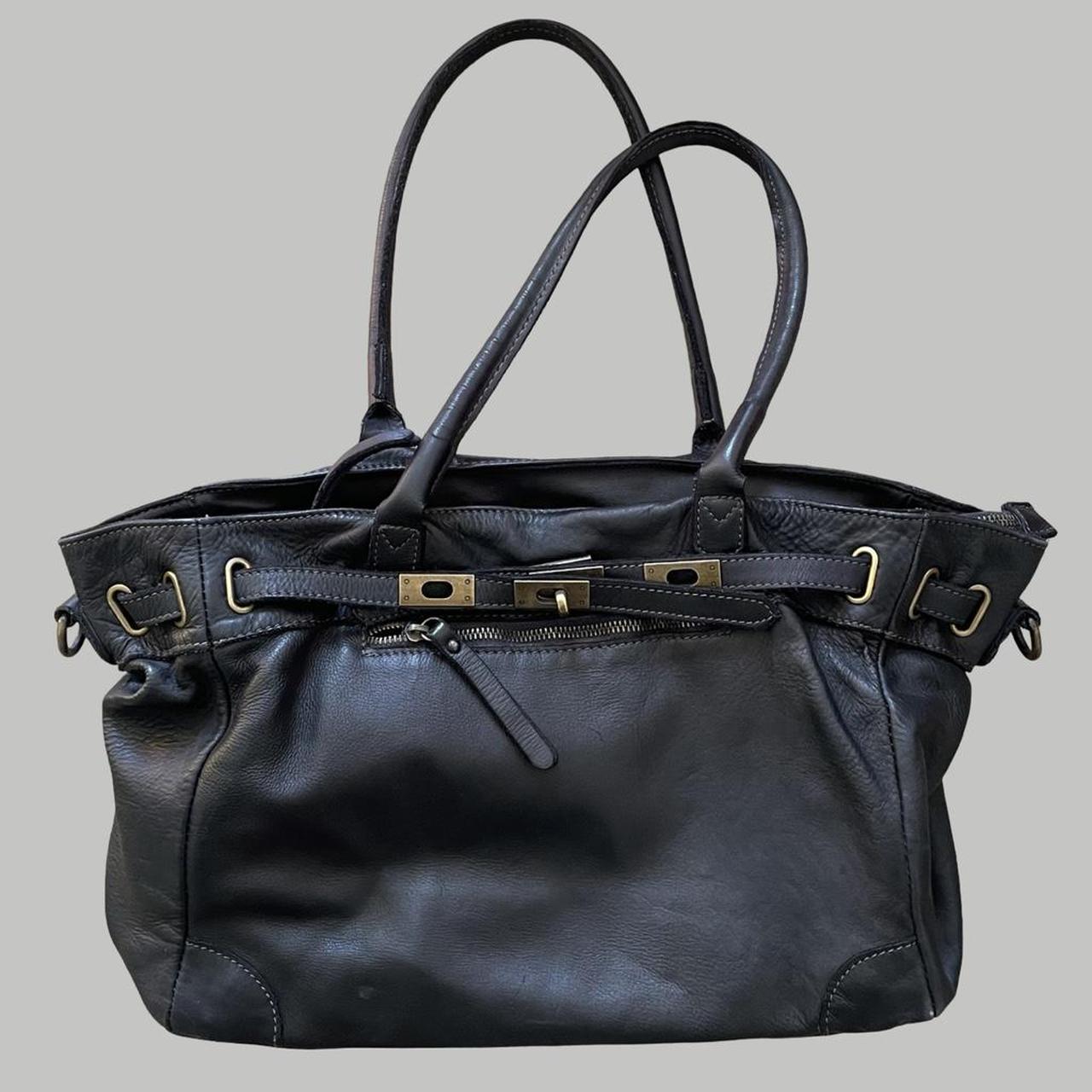 Black (large) leather firkin bag.