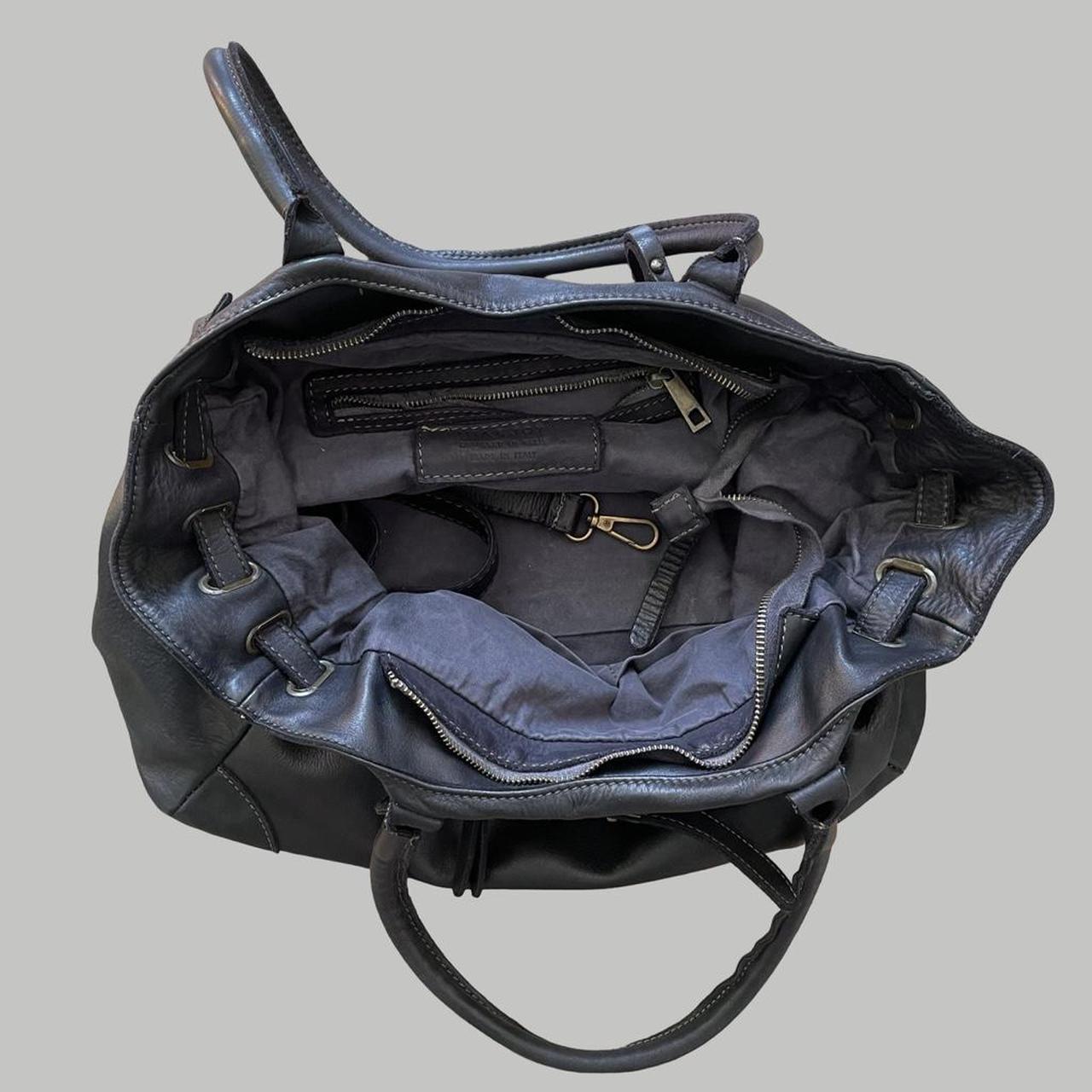 Black (large) leather firkin bag.