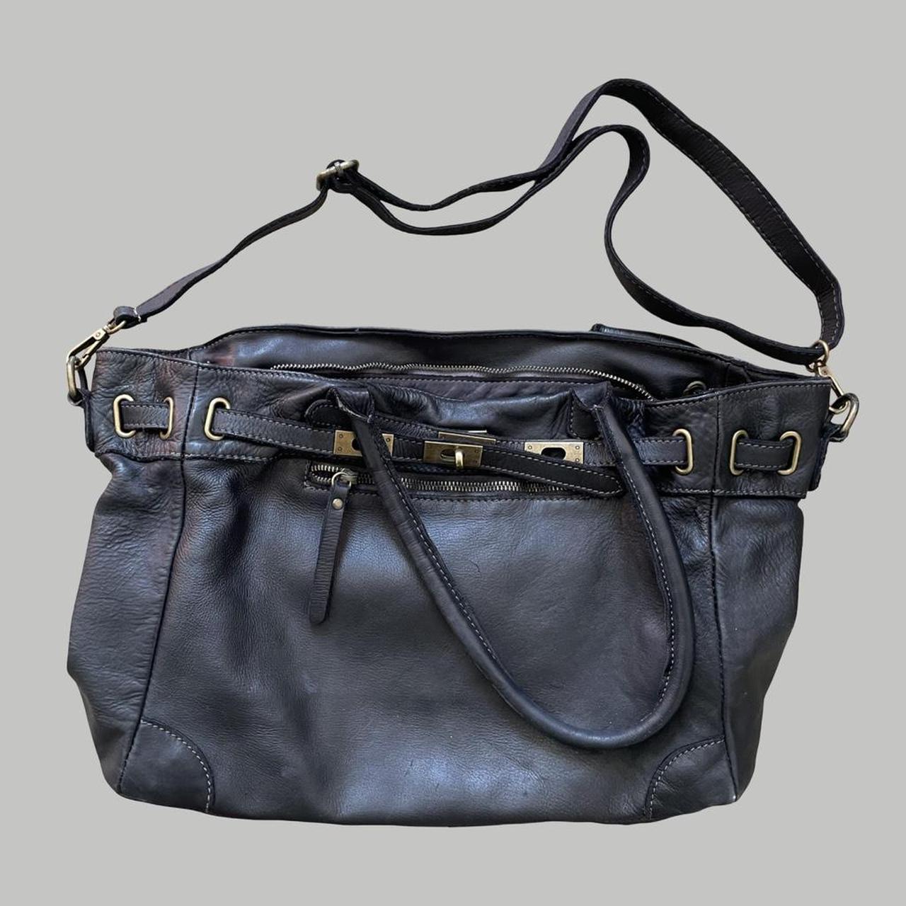 Black (large) leather firkin bag.