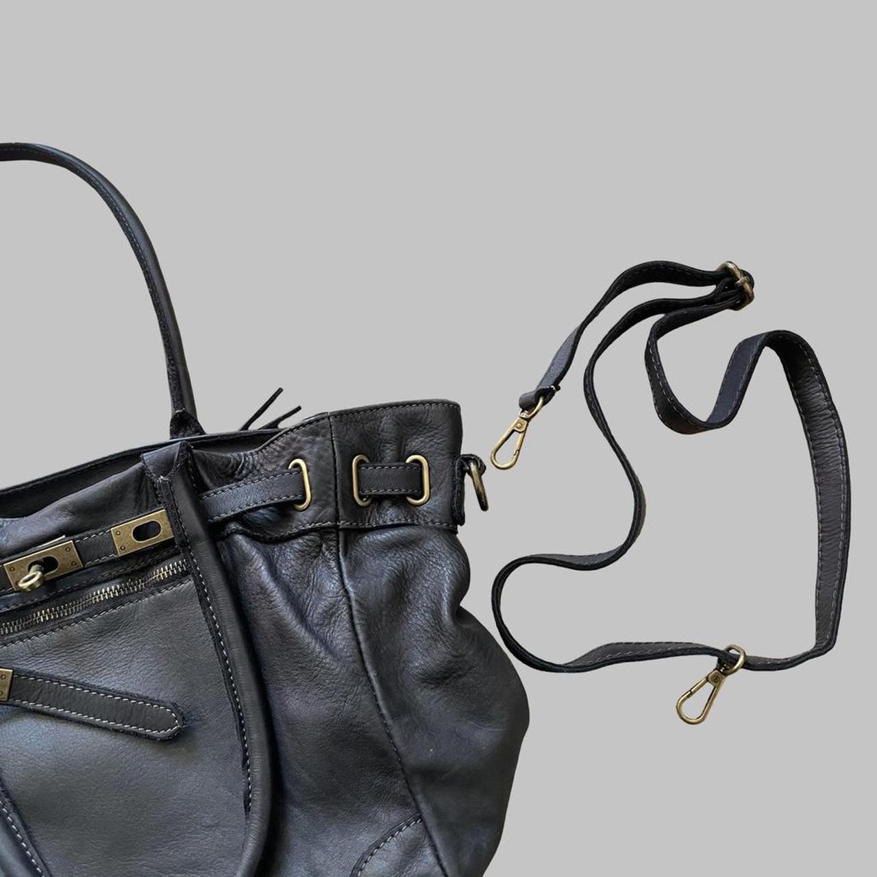 Black (large) leather firkin bag.