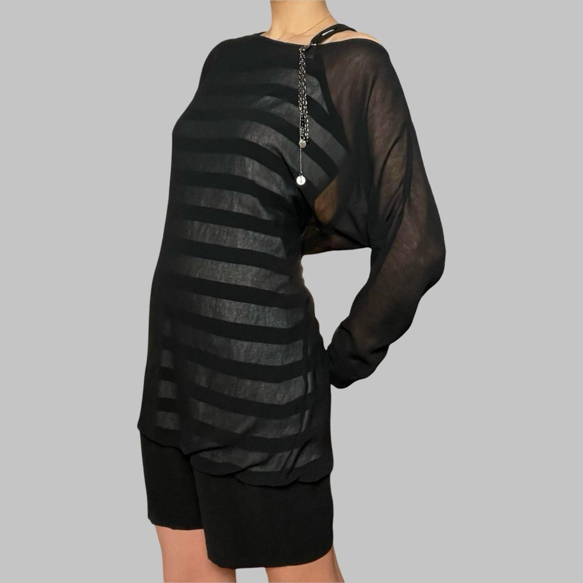 Cop copine layered black mini dress.