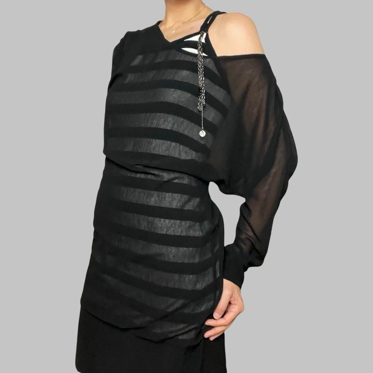 Cop copine layered black mini dress.