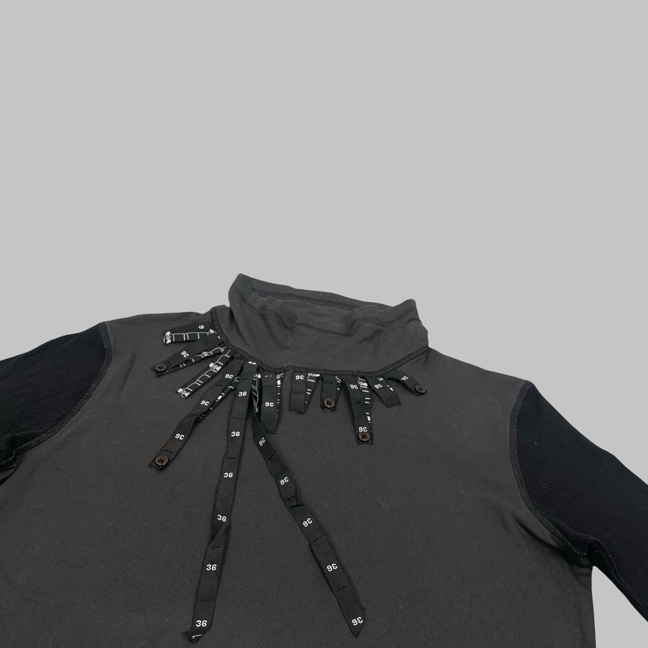 Cop Copine charcoal and black layered top.