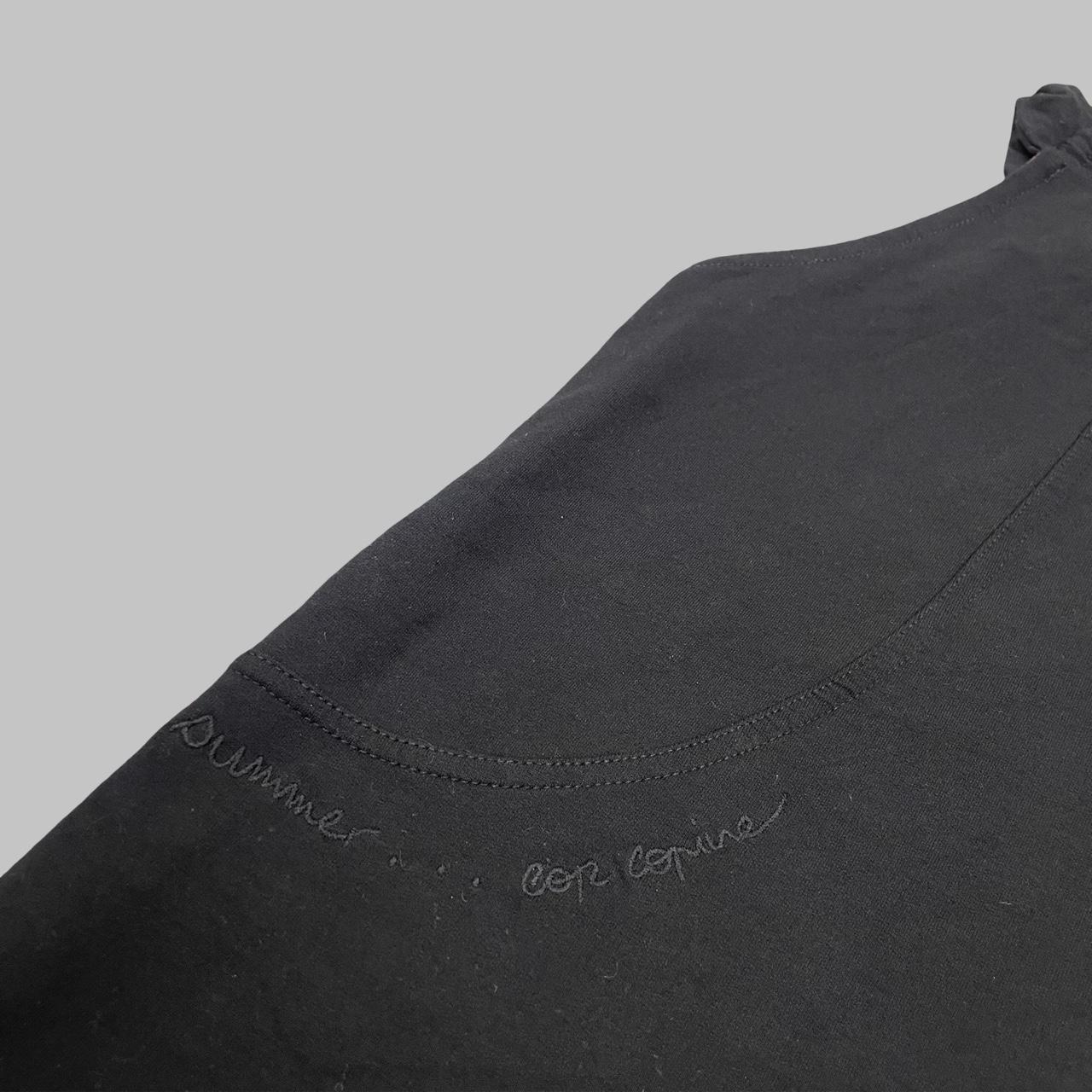 Cop Copine black sleeveless hooded top.