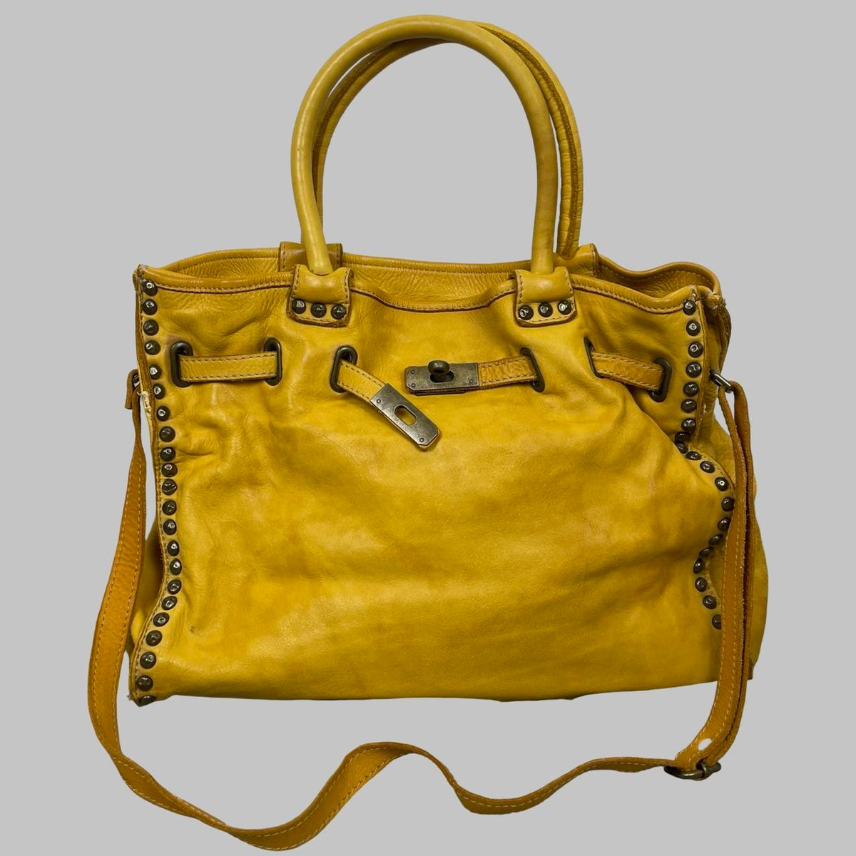 Large yellow leather studded firkin bag. — photo 2