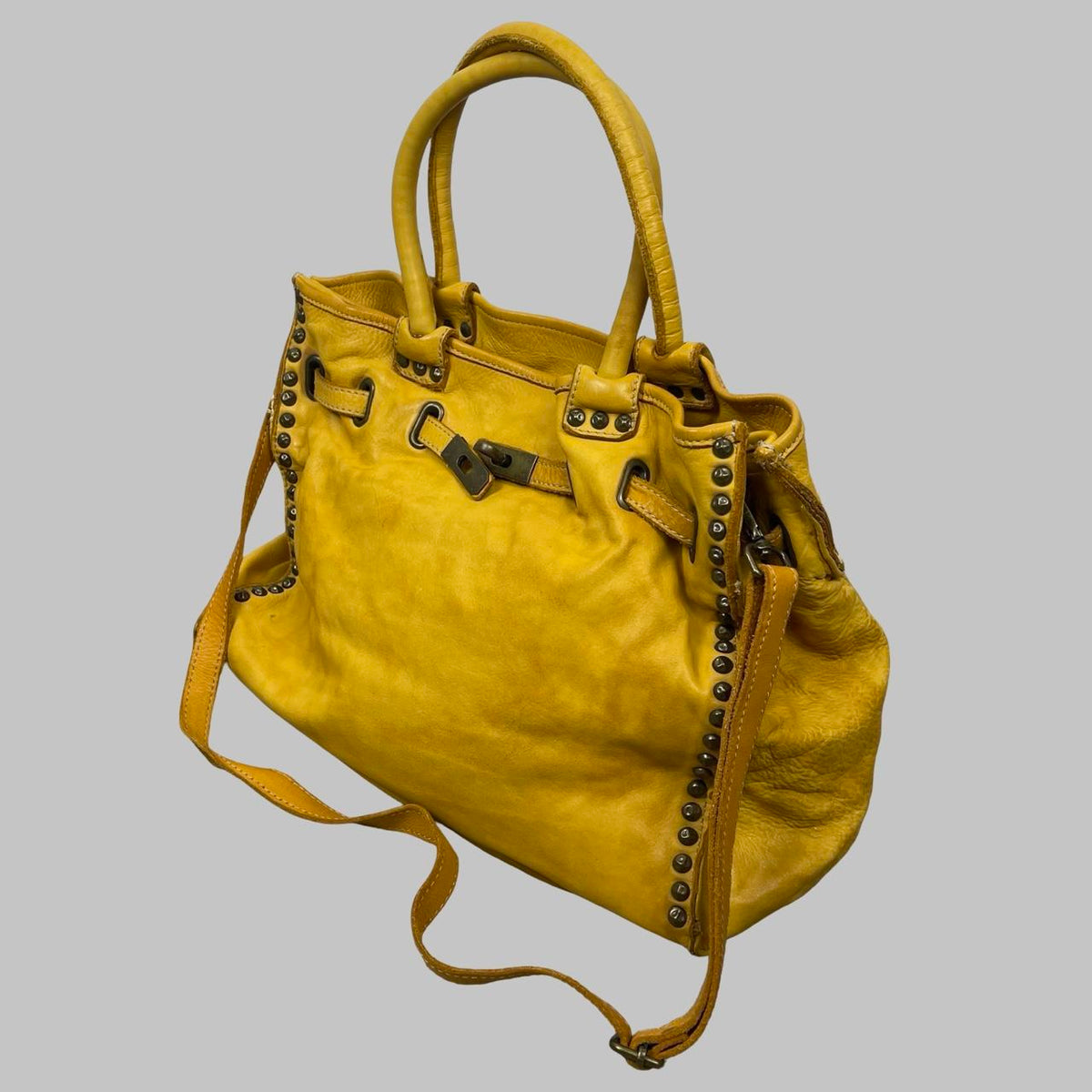 Large yellow leather studded firkin bag. — photo 3