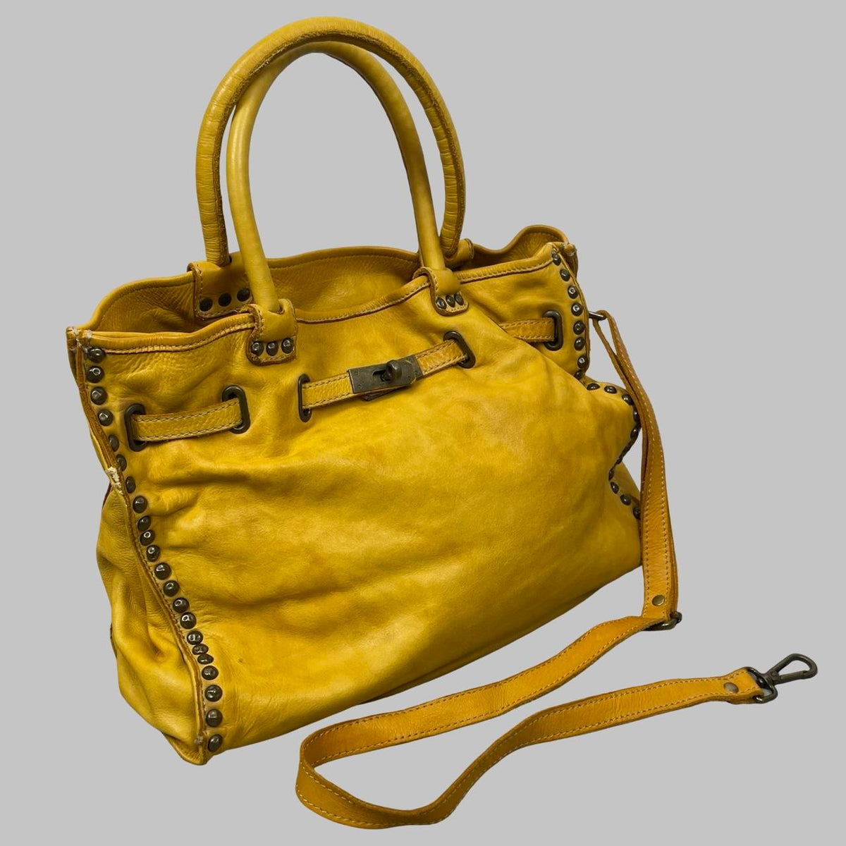 Large yellow leather studded firkin bag. — photo 4