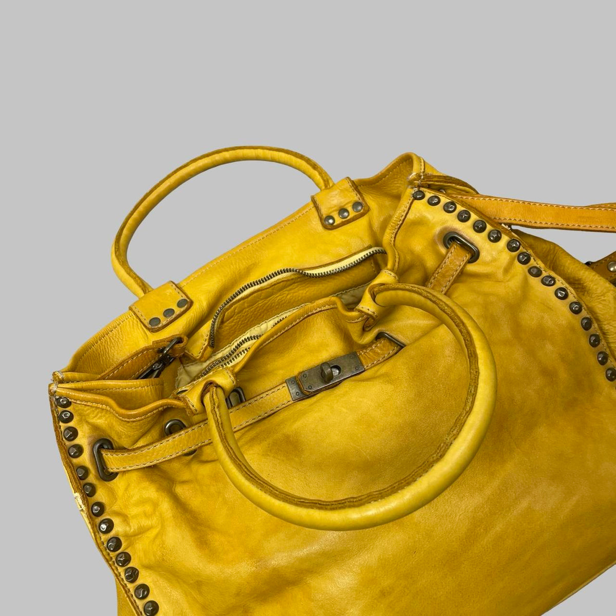 Large yellow leather studded firkin bag. — photo 5