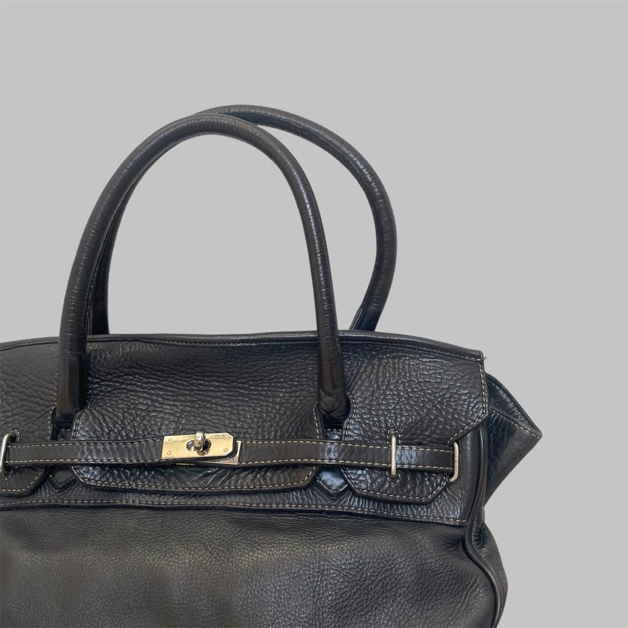 Black (large) leather firkin bag.