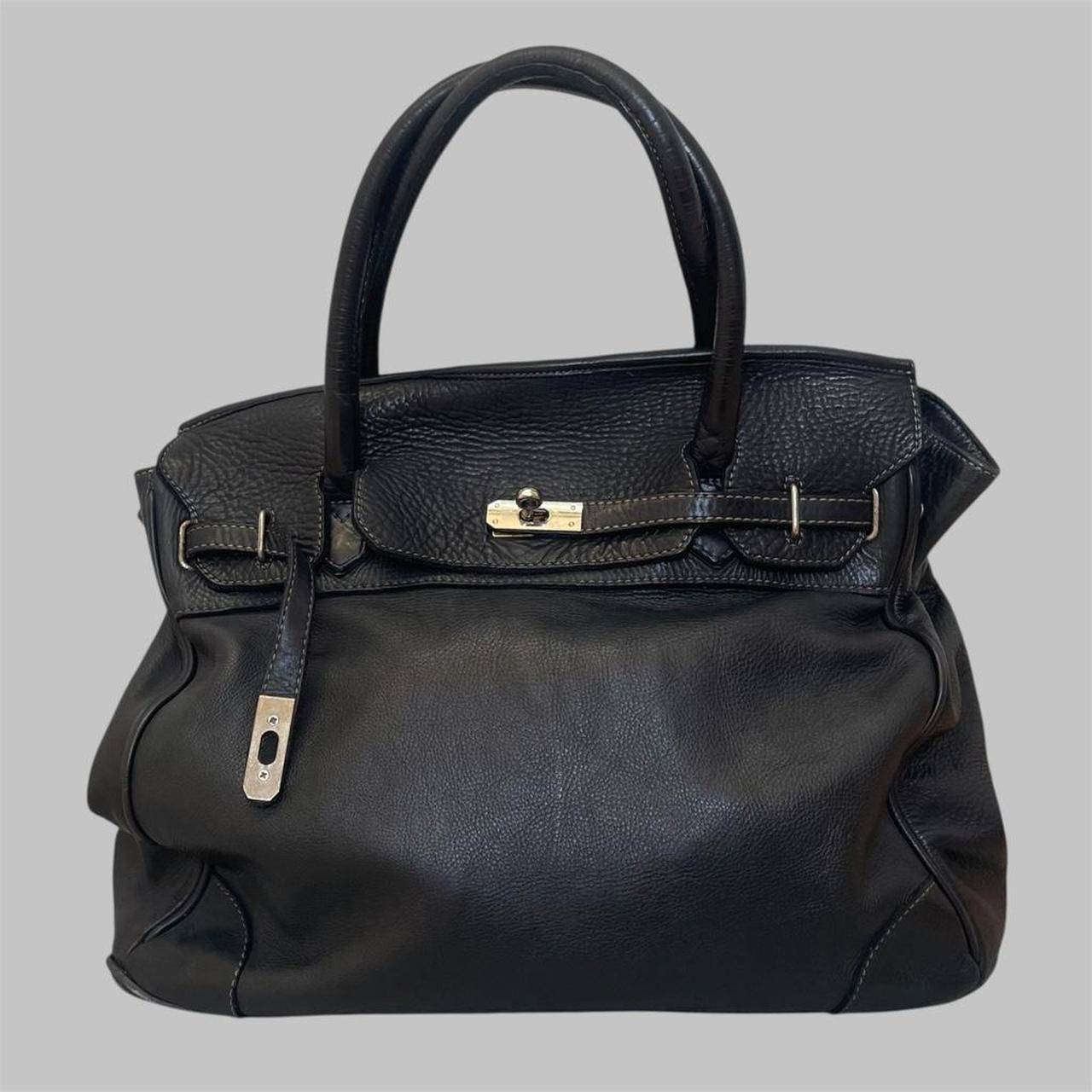 Black (large) leather firkin bag.