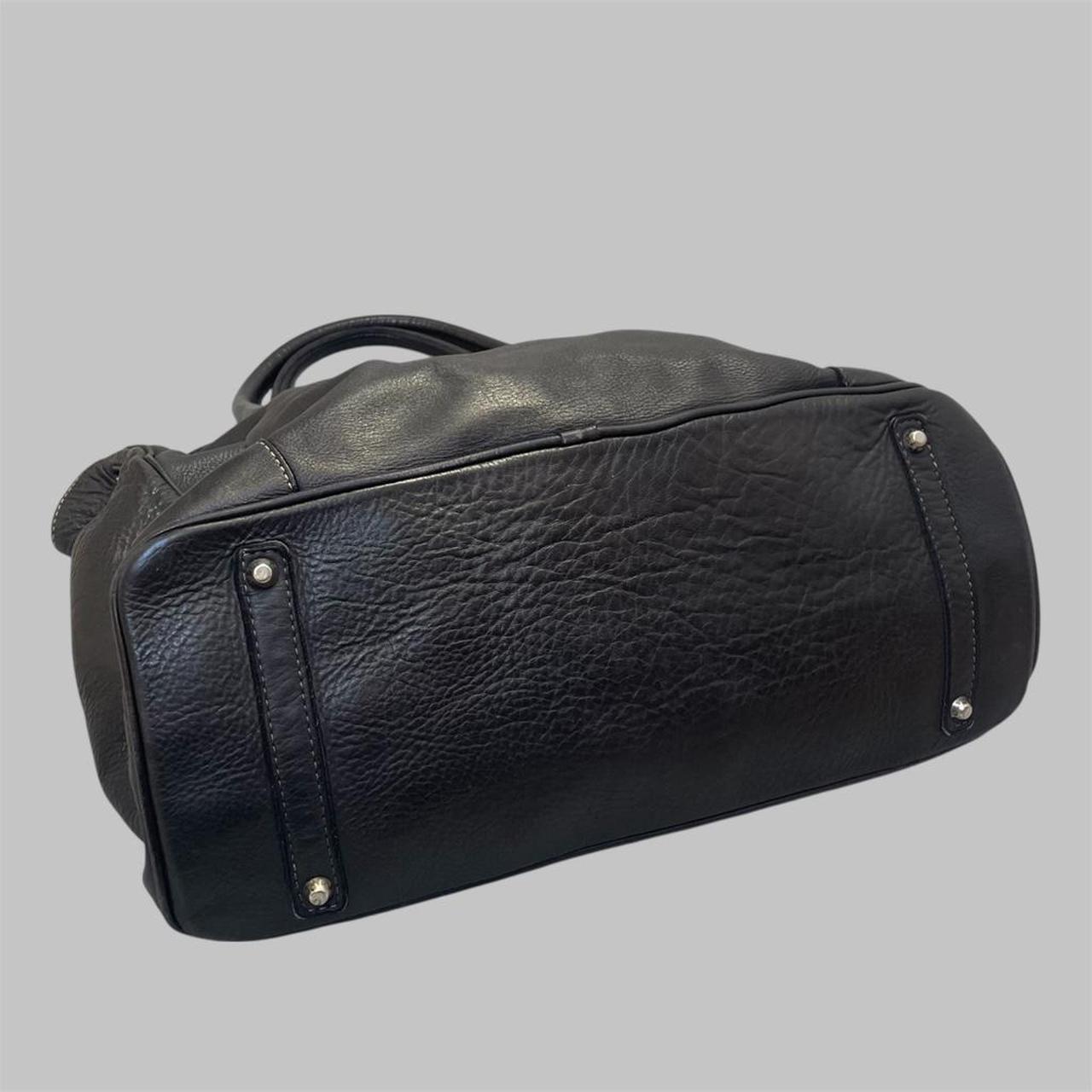 Black (large) leather firkin bag.