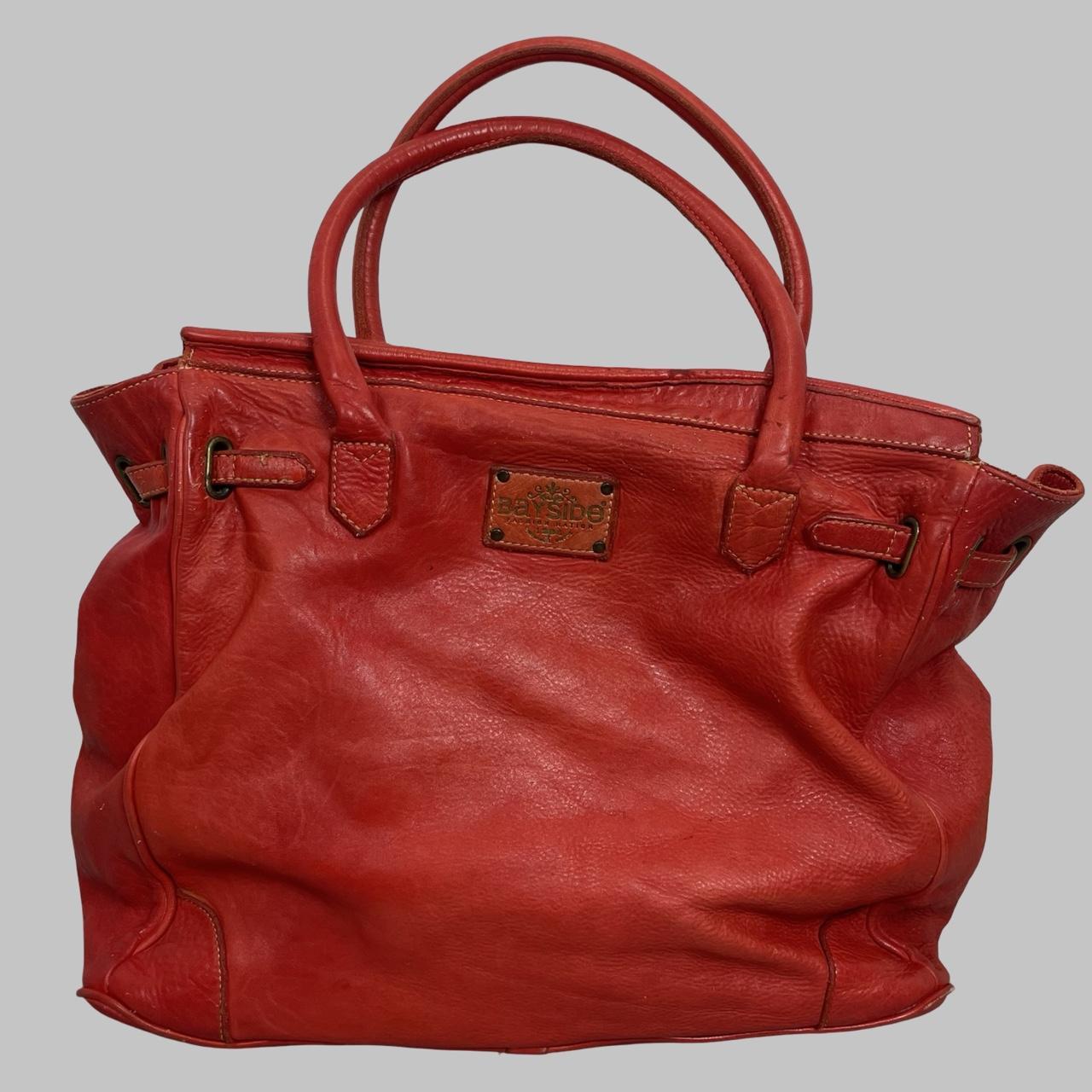 02 - Large red leather Firkin bag.