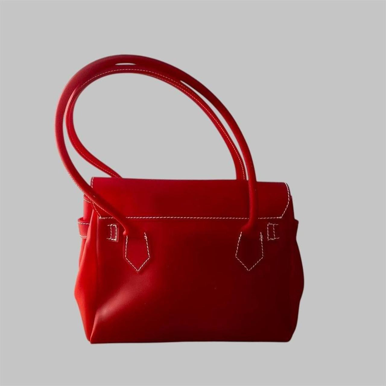 Red jelly pvc firkin bag.