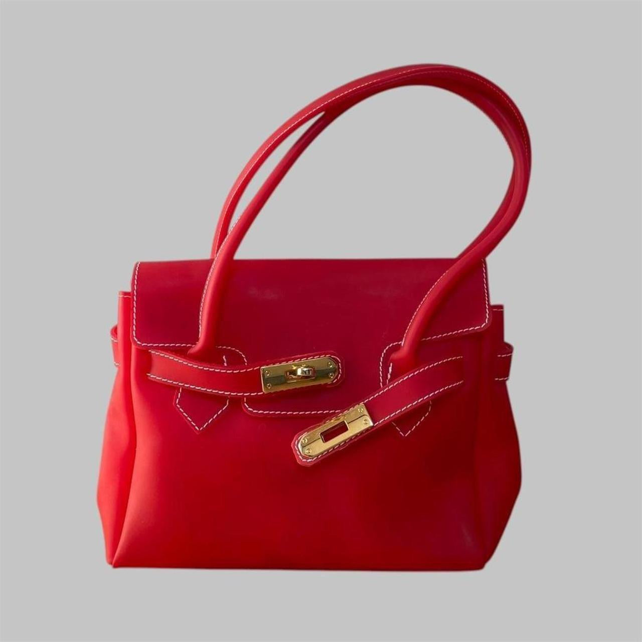 Red jelly pvc firkin bag.