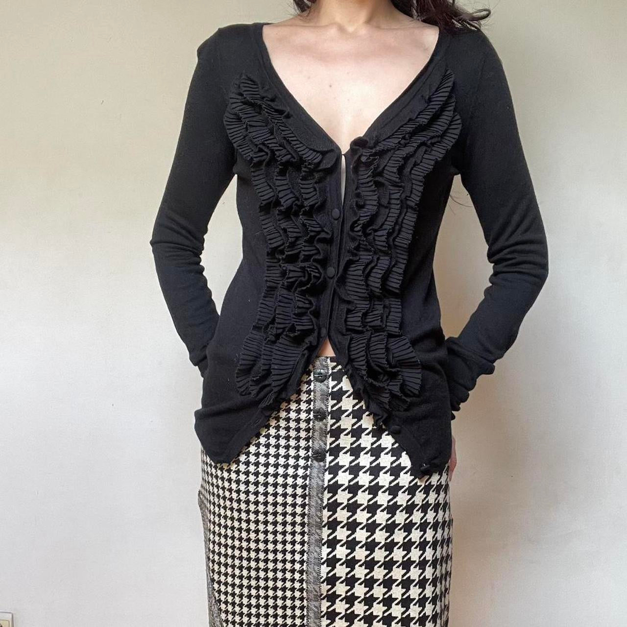 Italian black ruffle cardigan.