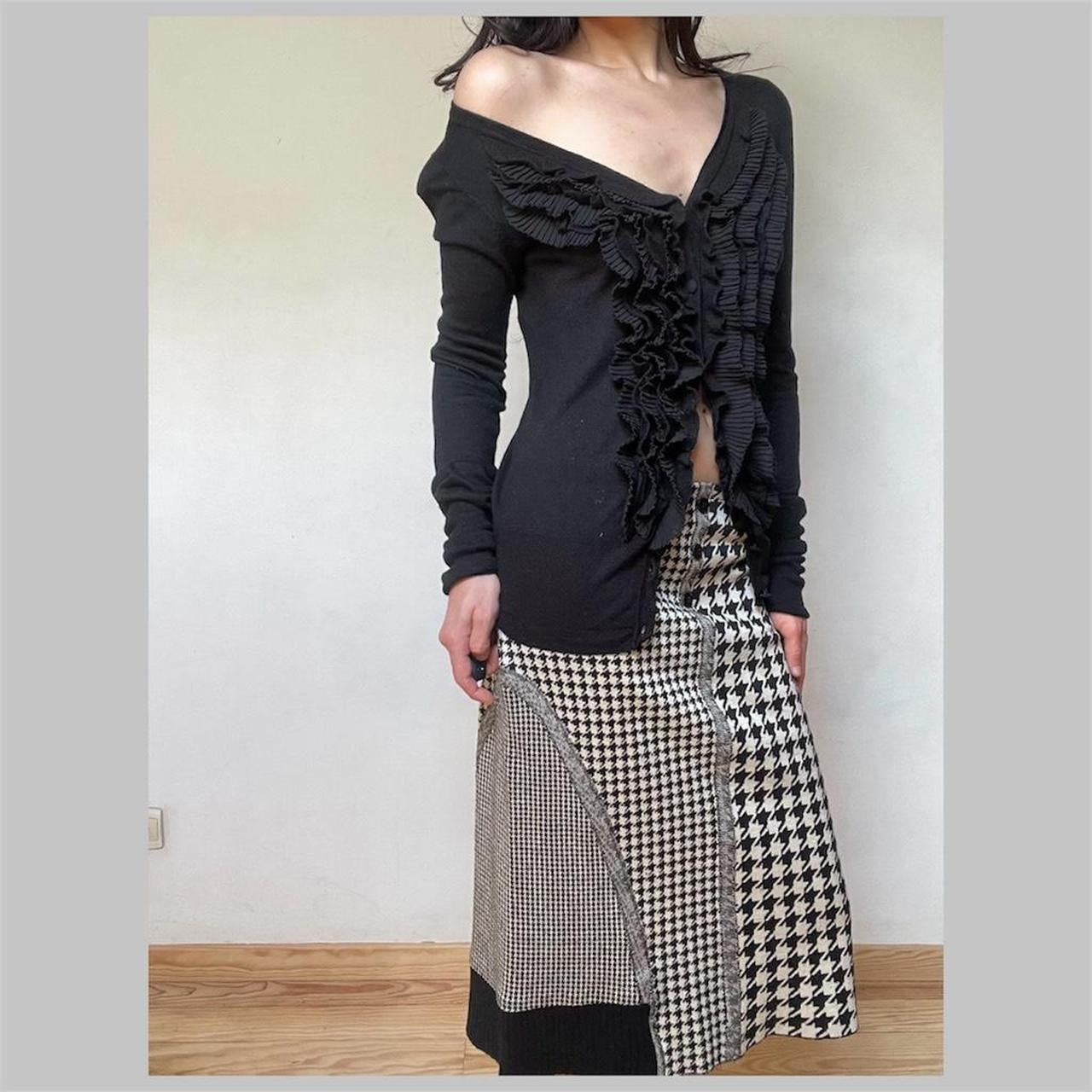 Italian black ruffle cardigan.