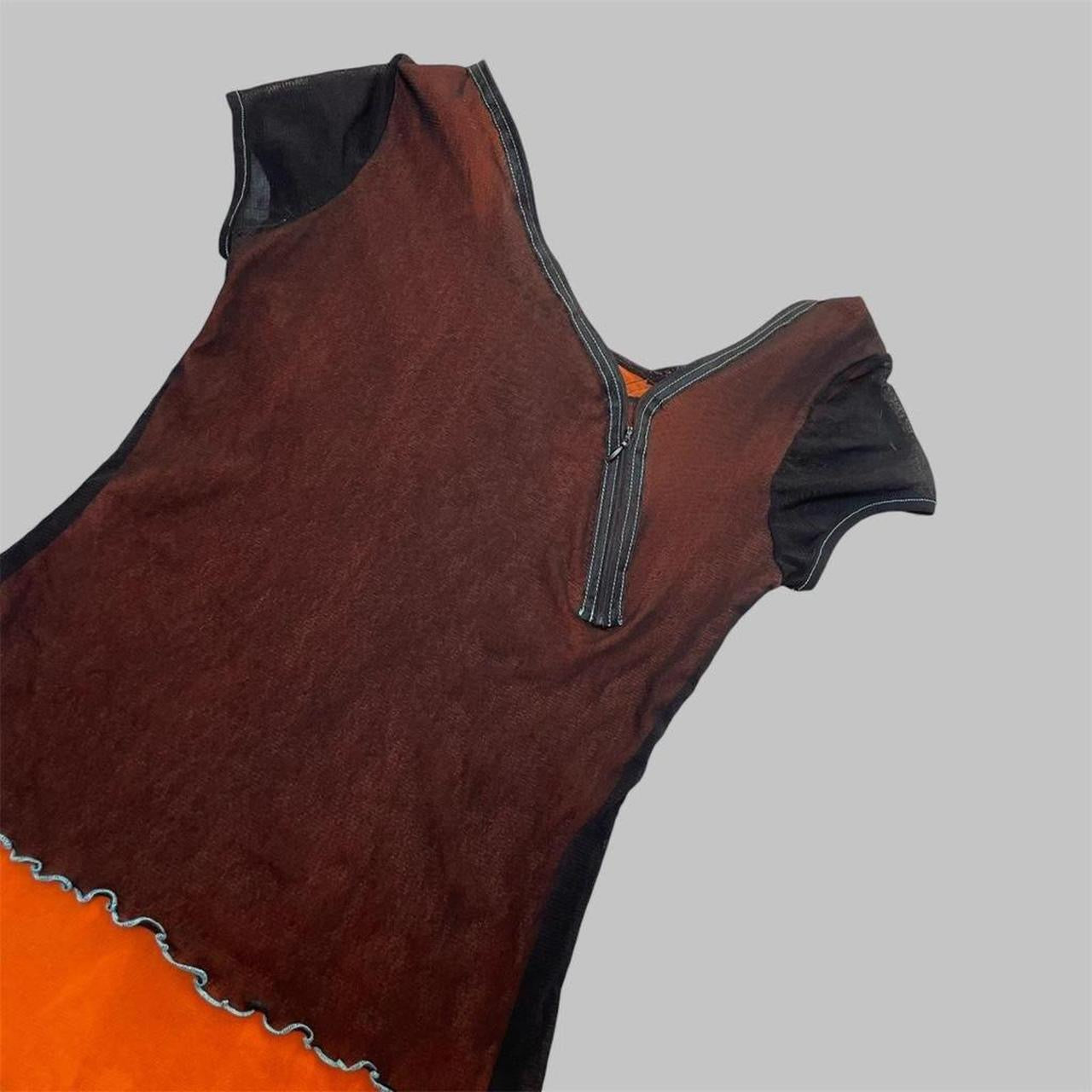 French black and orange mesh two-way top.