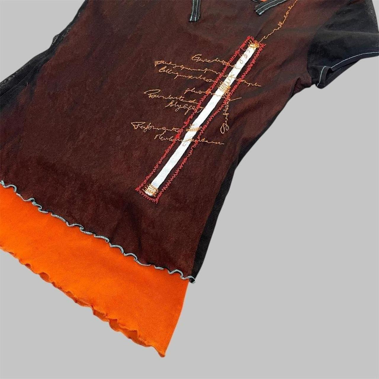French black and orange mesh two-way top.