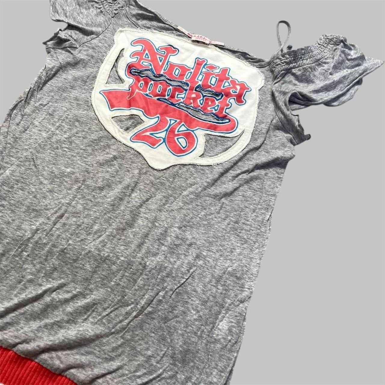 SOLD - Italian off-shoulder graphic top.