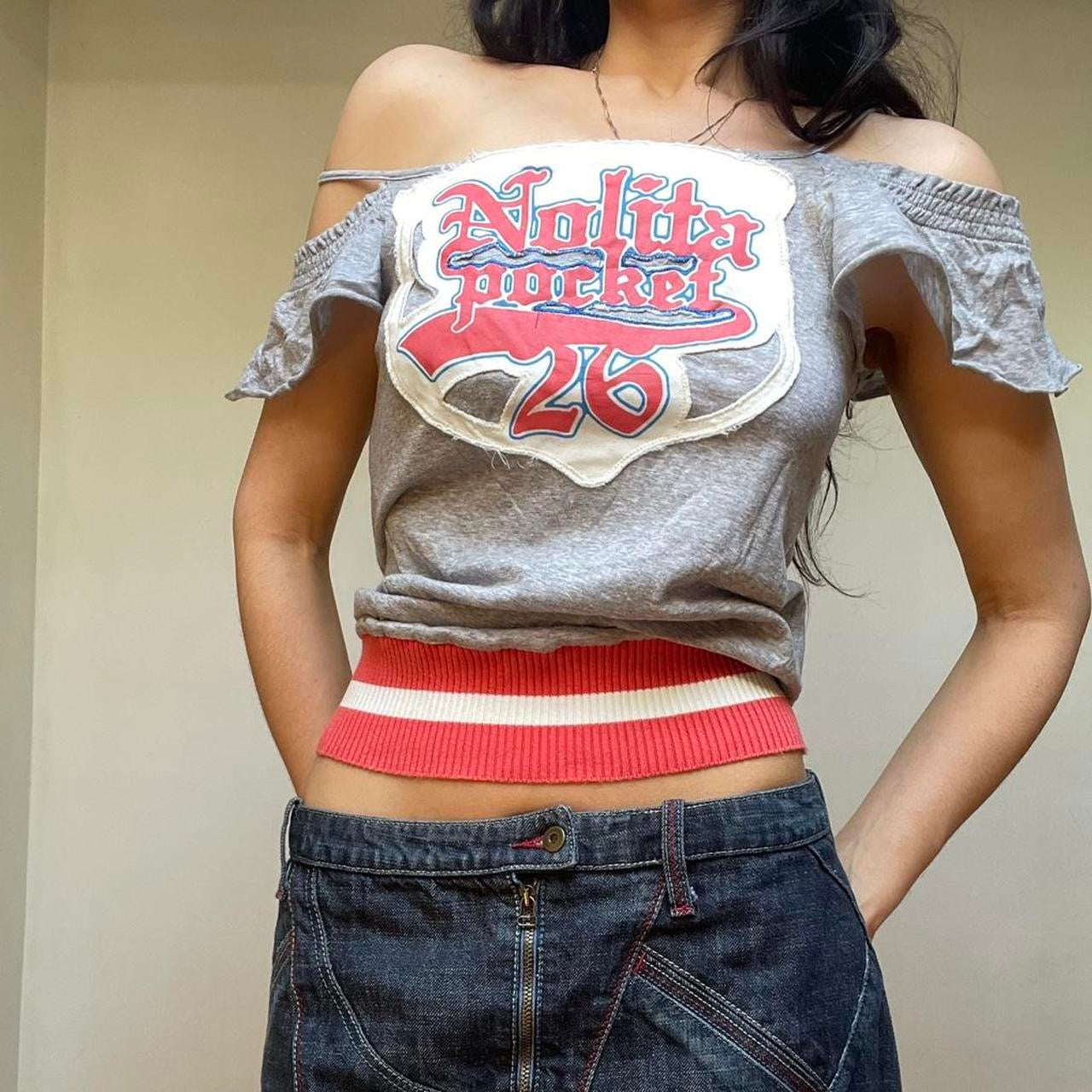 SOLD - Italian off-shoulder graphic top.