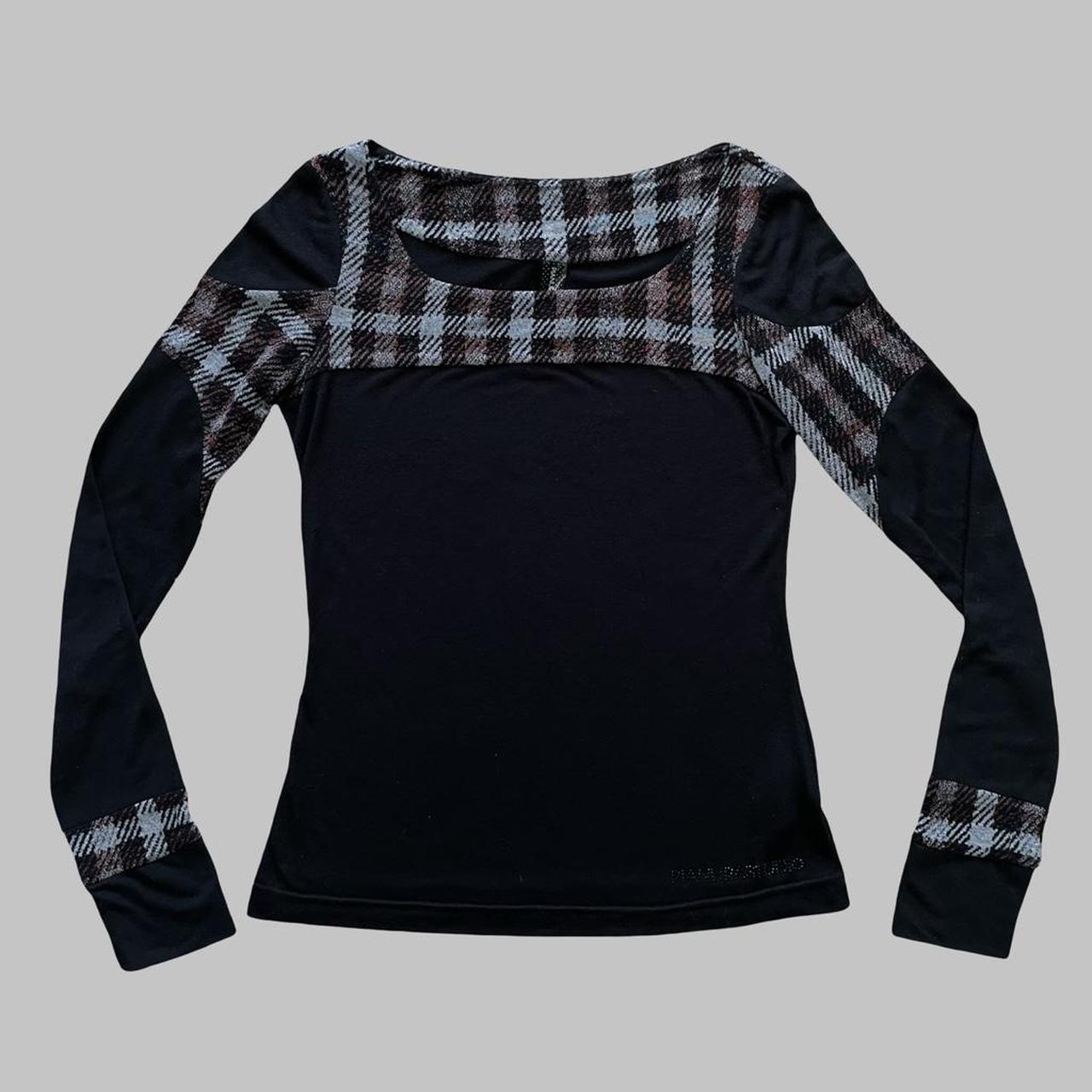 Italian black long-sleeve top with black and plaid motif.