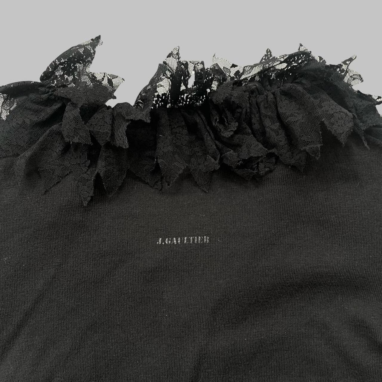 Jean Paul Gaultier black cardigan with lace collar.