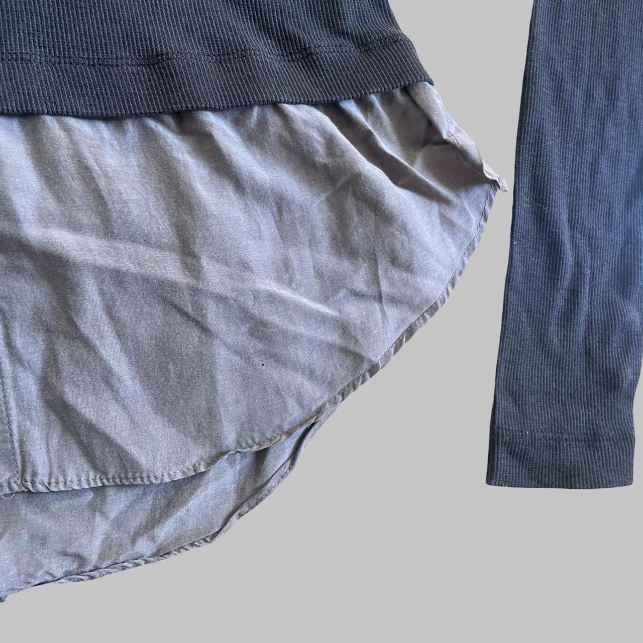 Cop Copine grey trompe-l’œil layered top.