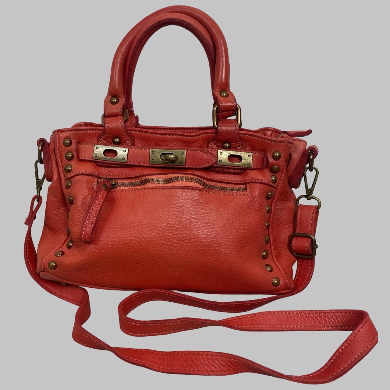 03 - Small red leather firkin bag with studs.