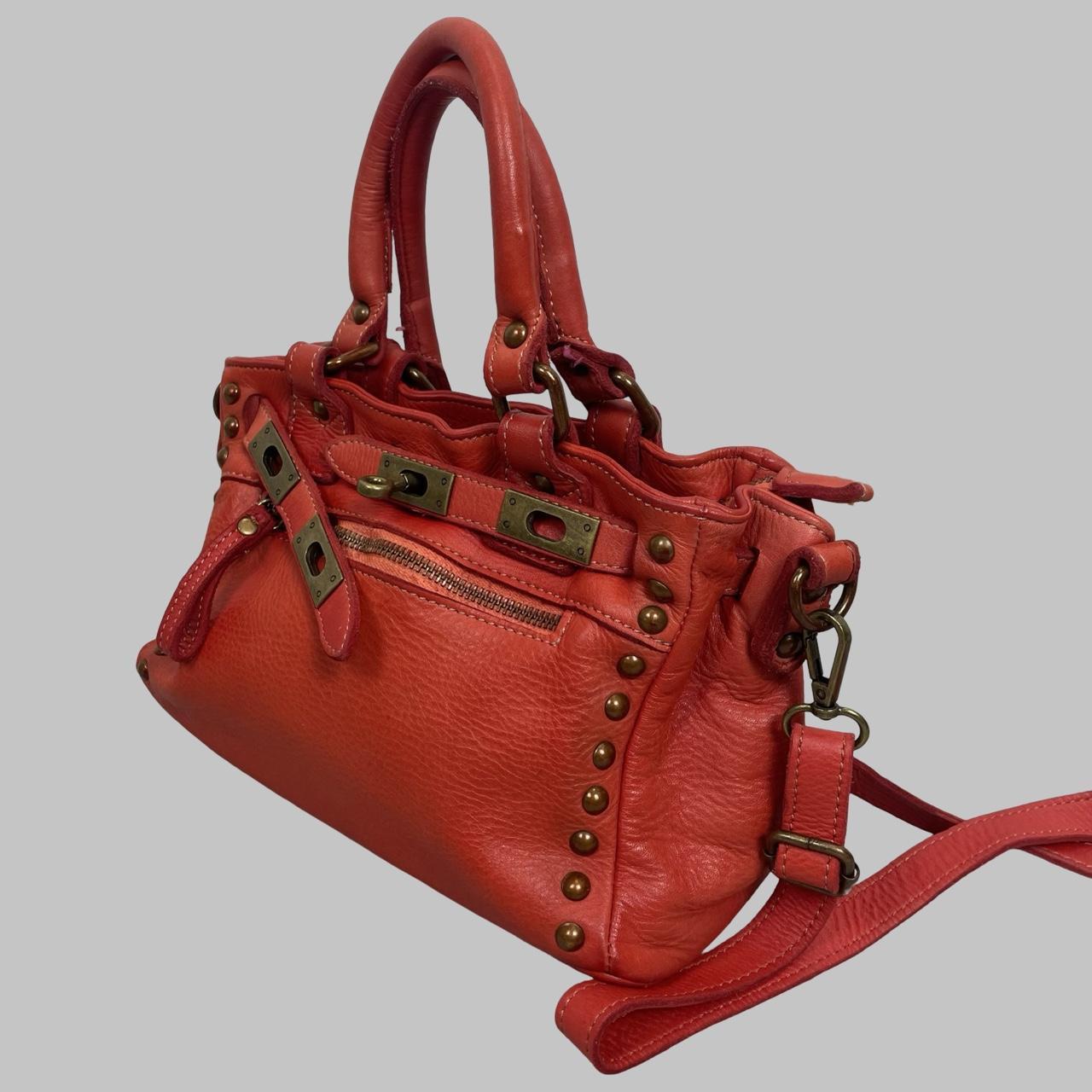 03 - Small red leather firkin bag with studs.