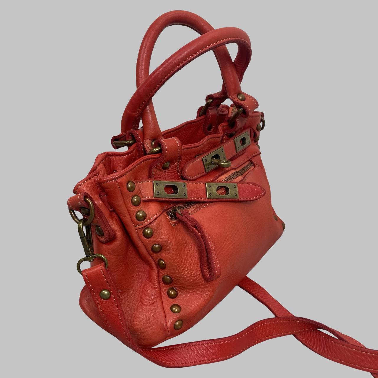 03 - Small red leather firkin bag with studs.