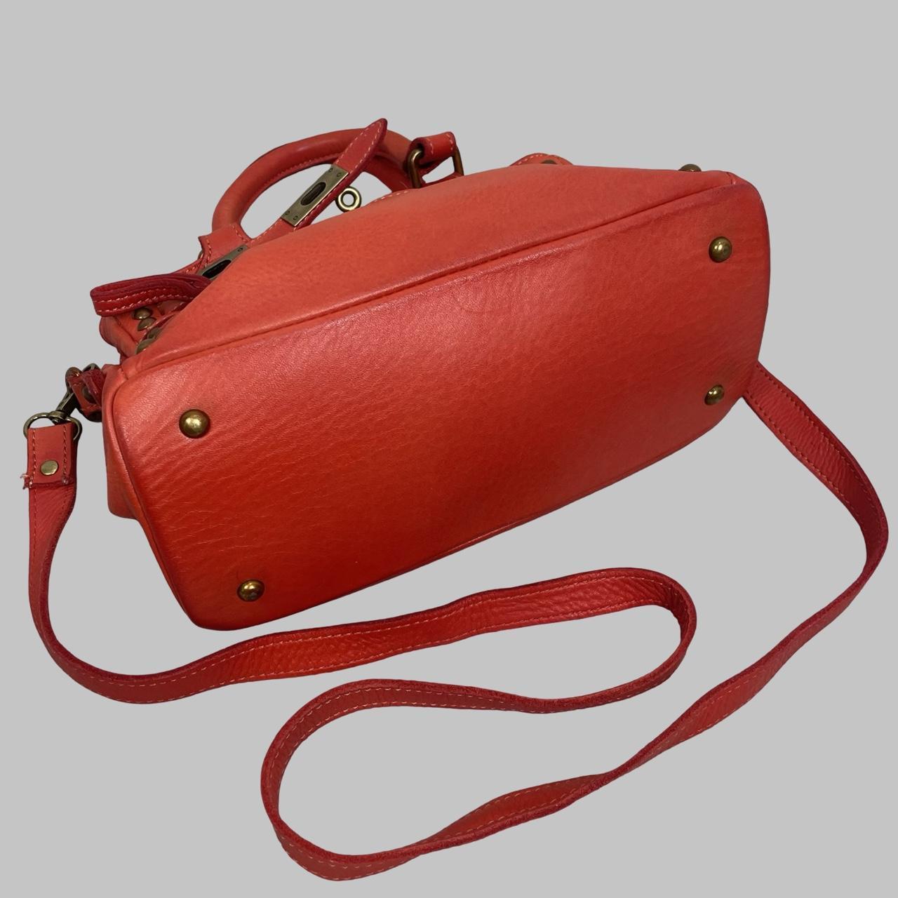 03 - Small red leather firkin bag with studs.