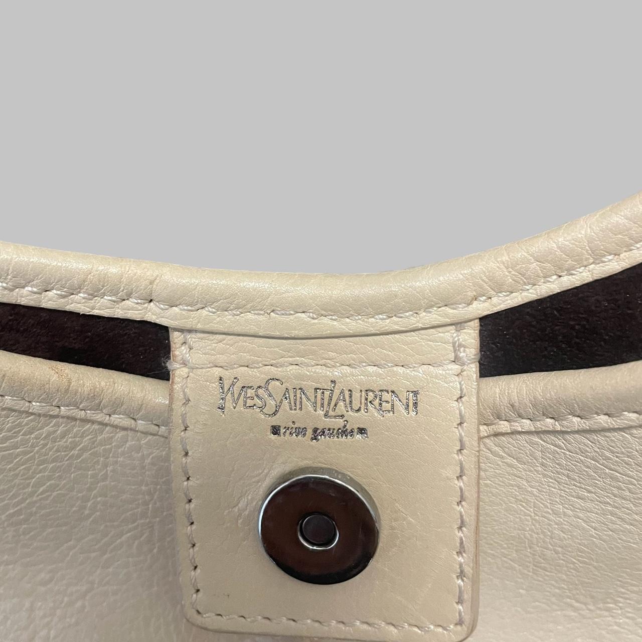 Yves Saint Laurent cream leather bag.