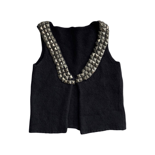 Sleeveless knit black vest with silver studs.