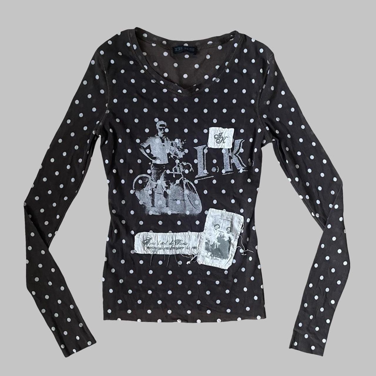 Brown polka dot mesh top.