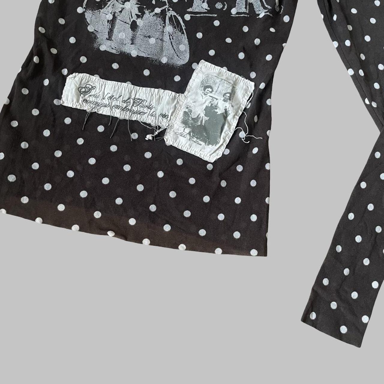 Brown polka dot mesh top.