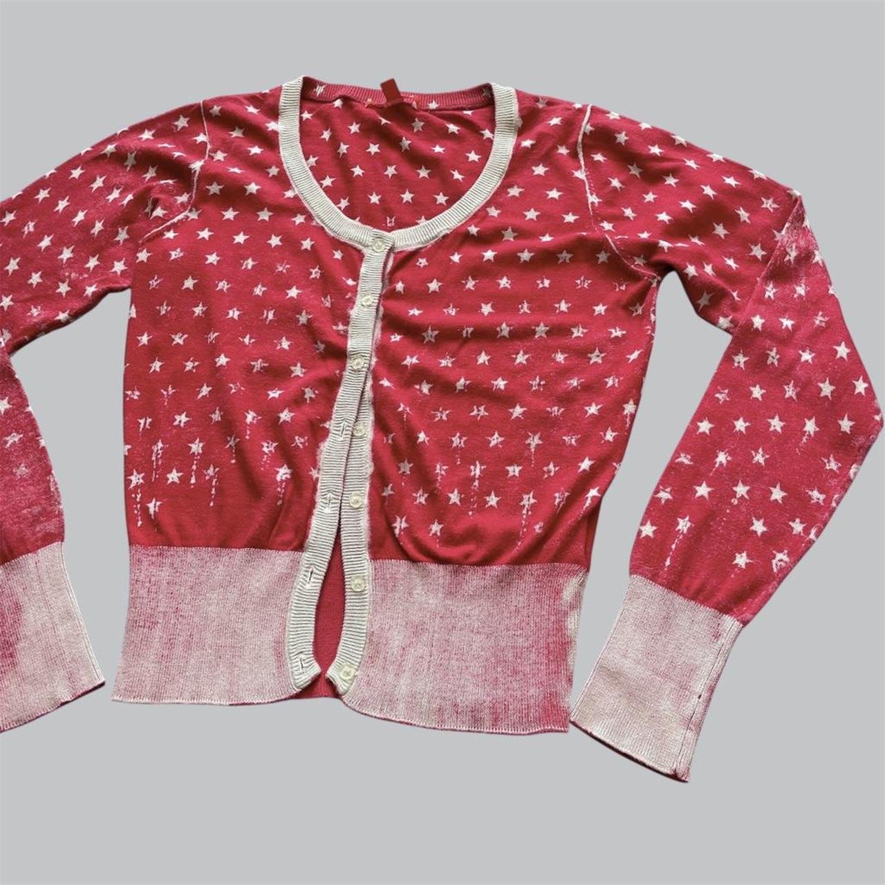 Red and white cardigan.