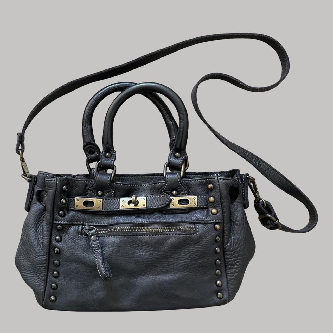 Black (small) leather firkin bag with studs.